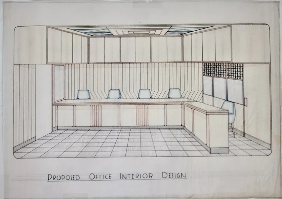 Office perspective with long work counter, blue chairs, overhead cabinets, paneled walls, tiled floor, and geometric ceiling.