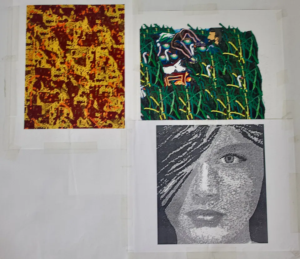 Sheet with a rust and yellow pattern, a green scenic textile design, and a monochrome portrait of a woman.