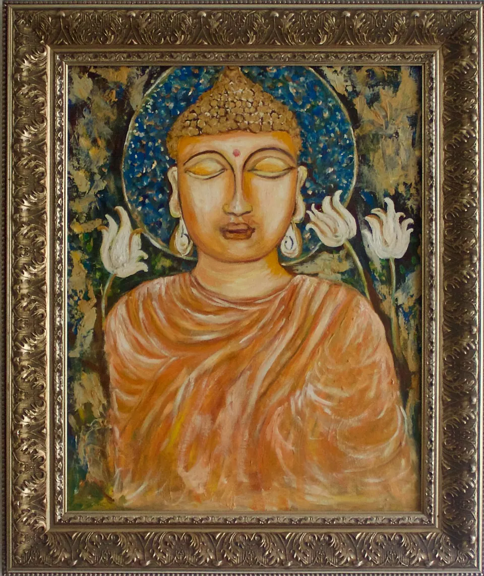 Front-facing Buddha in an orange robe with closed eyes, white flowers, and a textured blue halo.